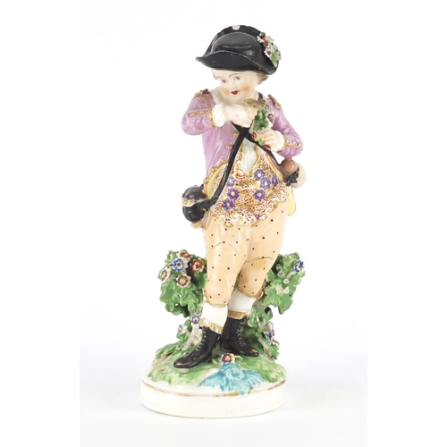 615 - 18th century Derby porcelain figure of a boy with flower, scripted marks to base,18cm high