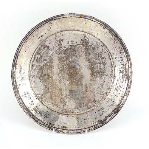 509 - Persian circular silver tray profusely engraved with figures, cattle and birds amongst flowers, impr... 