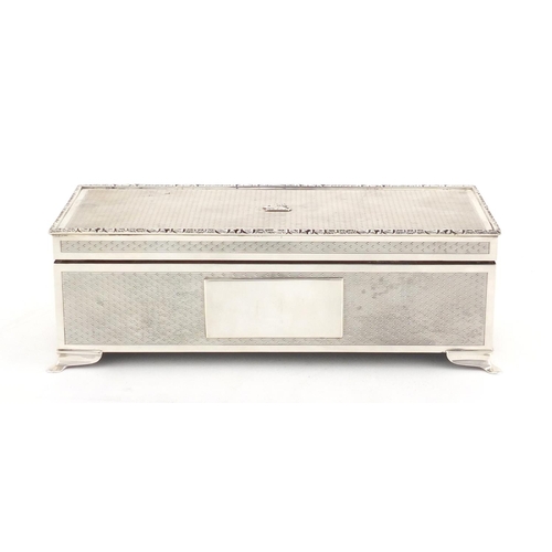 766 - Good quality rectangular silver cigar box with engine turned decoration and lion crest, by Harman Br... 