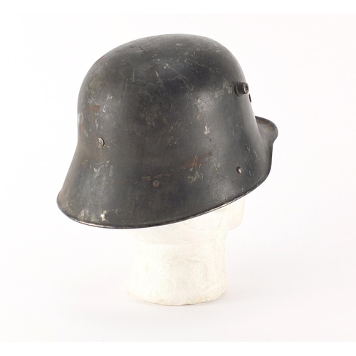 294 - German Military interest tin helmet with leather liner