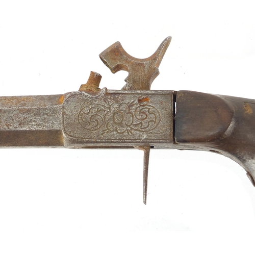 328 - Antique percussion cap pistol with octagonal barrel, engraved with flowers, 17cm in length