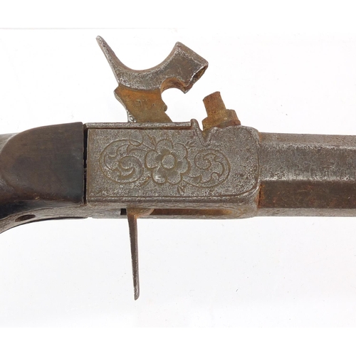 328 - Antique percussion cap pistol with octagonal barrel, engraved with flowers, 17cm in length