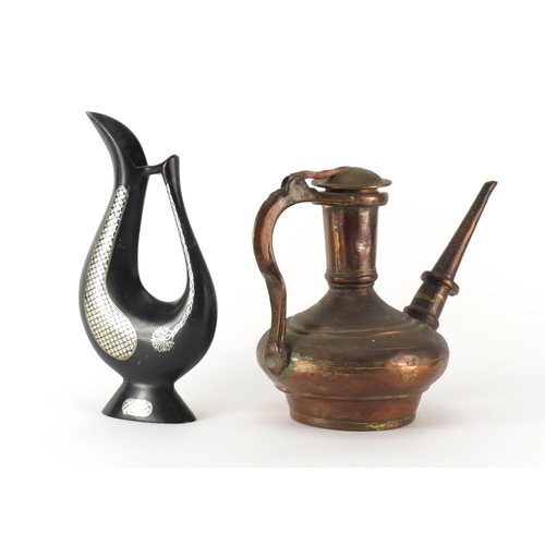 579 - Indian Bidriware ewer with silvered inlay and an Islamic copper water jug, the largest 26cm high