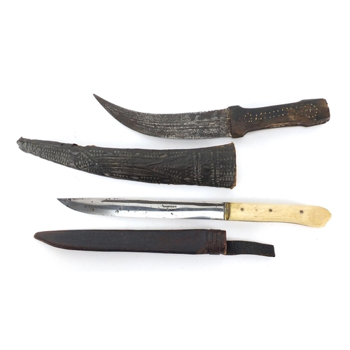 597 - Two Ottoman and Middle Eastern knives comprising a Yatagan with leather sheath and bone handle and o... 