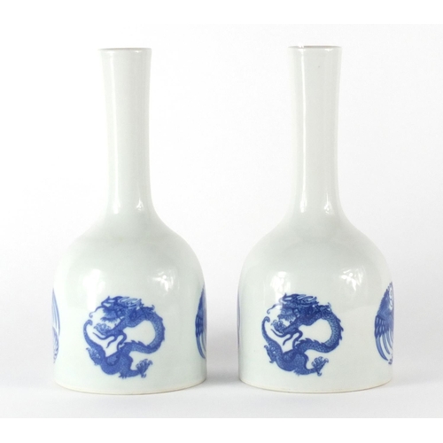 343 - Pair of Chinese blue and white mallet vases, hand painted with roundels of phoenixes and dragons, si... 