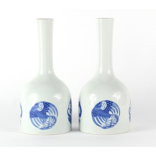 343 - Pair of Chinese blue and white mallet vases, hand painted with roundels of phoenixes and dragons, si... 