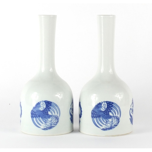 343 - Pair of Chinese blue and white mallet vases, hand painted with roundels of phoenixes and dragons, si... 