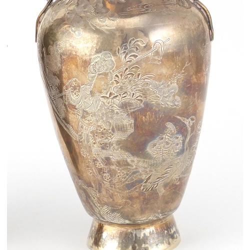 474 - Pair of Chinese silver vases with twin handles, each engraved with figures and cranes, character mar... 