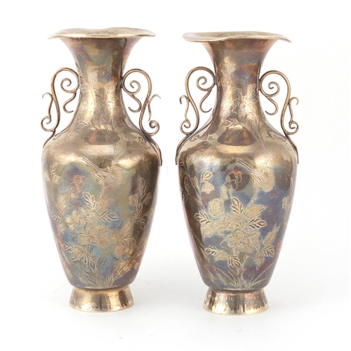 474 - Pair of Chinese silver vases with twin handles, each engraved with figures and cranes, character mar... 