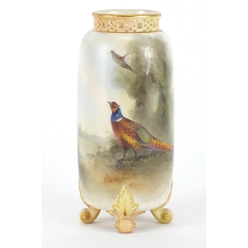 622 - Royal Worcester four footed vase with pierced rim, hand painted with a pheasant in a landscape by Ja... 