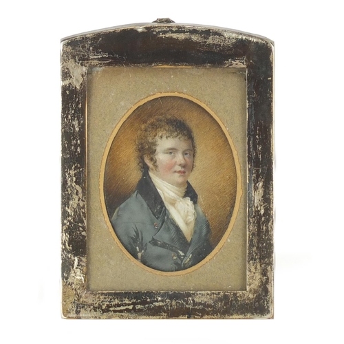 49 - Two antique oval hand painted portrait miniatures of gentlemen in formal dress, one housed in a rect... 