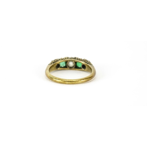 853 - Unmarked gold diamond and emerald ring, size M, 3.9g