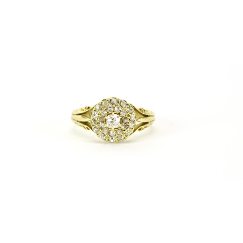 844 - 18ct gold diamond three tier cluster ring, with scrolled shoulders, W C makers mark, size Q, 4.7g