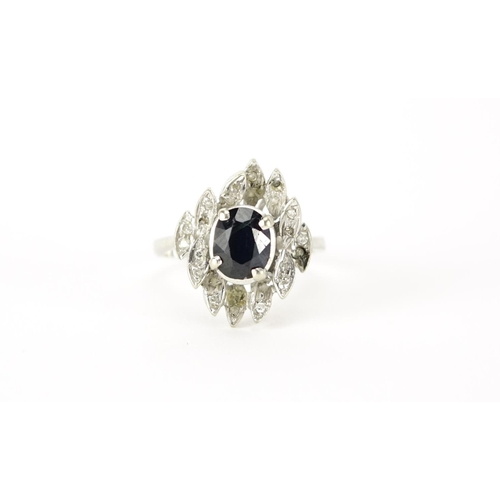882 - 18ct white gold sapphire and diamond ring, size N, 5.3g