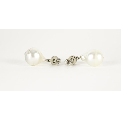 842 - Pair of unmarked white gold pearl and diamond solitaire drop earrings, 3.2cm in length, 16.6g