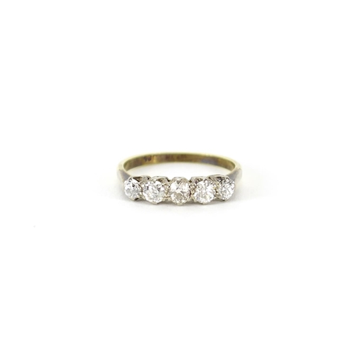 880 - 18ct gold diamond five stone ring, size Q, 3.2g, housed in a Kendal & Dent tortoiseshell leather box