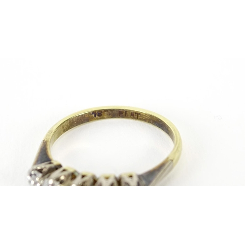 880 - 18ct gold diamond five stone ring, size Q, 3.2g, housed in a Kendal & Dent tortoiseshell leather box
