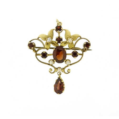 846 - Art Nouveau unmarked gold garnet and seed pearl pendant brooch, 5cm in length, 6.6g