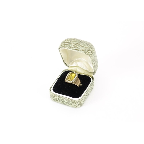 878 - Georgian unmarked gold citrine and seed pearl ring, size O, 3.5g