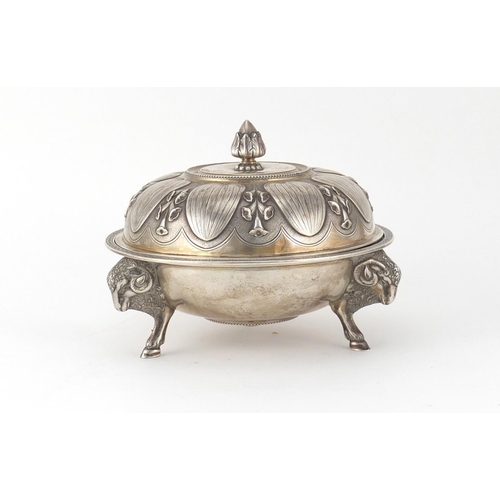 741 - Tiffany & Co silver muffin dish and cover, with three ram head legs and embossed with stylised flowe... 