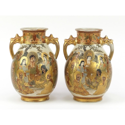 449 - Pair of Japanese Satsuma pottery vases with twin handles, each hand painted with sages, character ma... 