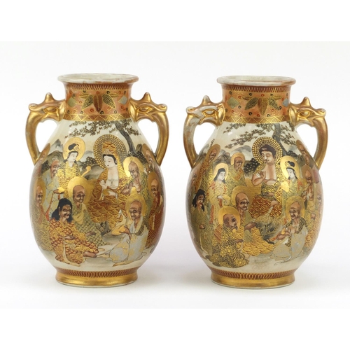 449 - Pair of Japanese Satsuma pottery vases with twin handles, each hand painted with sages, character ma... 