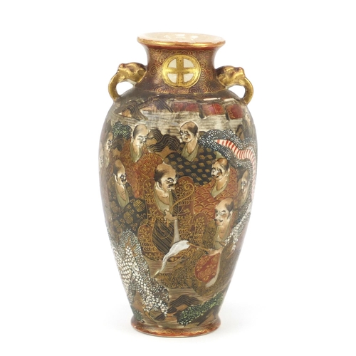 450 - Japanese Satsuma pottery vase with twin handles, hand painted with immortals and dragons, character ... 