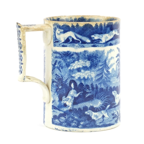 614 - 19th century blue and white pottery tankard transfer printed with a hunting scene, 12.5cm high