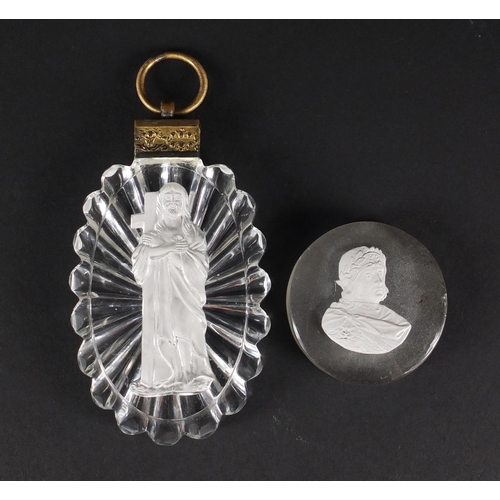 53 - Baccarat sulphide pendant of Christ holding the cross, together with a 19th century sulphide plaque ... 