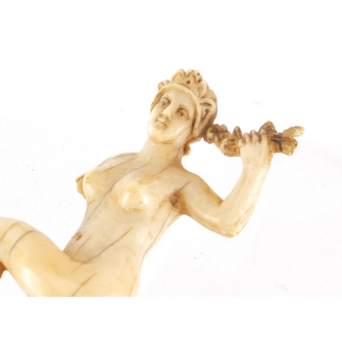 106 - Antique continental ivory carving of a nude female, 7cm high