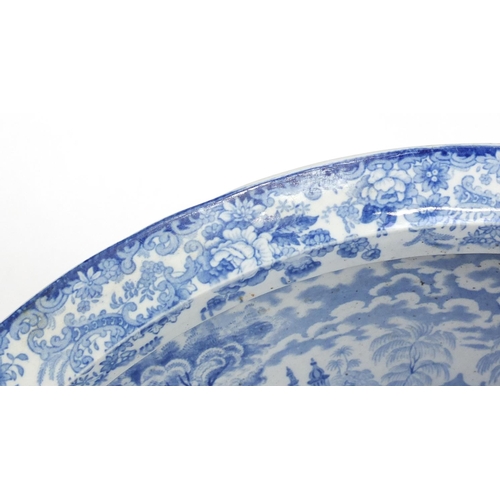 621 - Victorian blue and white two piece toilet, transfer printed in the Oriental pattern, the bowl 40cm i... 