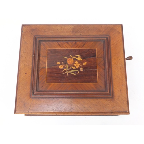 142 - 19th century walnut polyphone by Schutz, the hinged lid with floral marquetry inlay, 22cm H x 54cm W... 