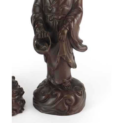 471 - Two Chinese hardwood carving including an example of Guanyin holding a basket of fish, the largest 3... 