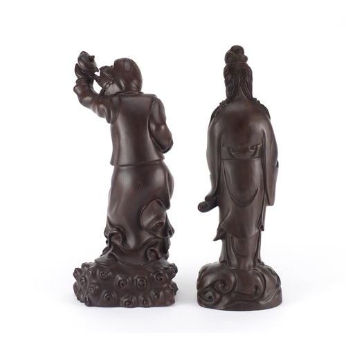 471 - Two Chinese hardwood carving including an example of Guanyin holding a basket of fish, the largest 3... 