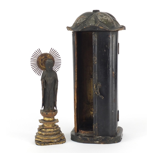 473A - Japanese travel shrine, housed in a lacquered case with gilt interior, the case 29cm high