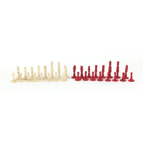 162 - Part stained carved ivory travel chess set, the largest piece approximately 5cm high