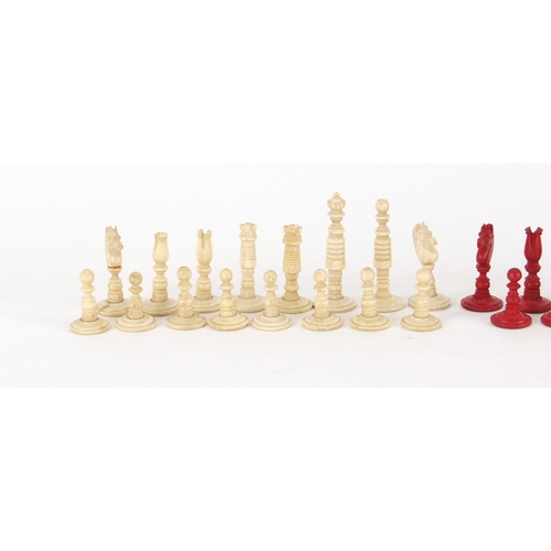 162 - Part stained carved ivory travel chess set, the largest piece approximately 5cm high