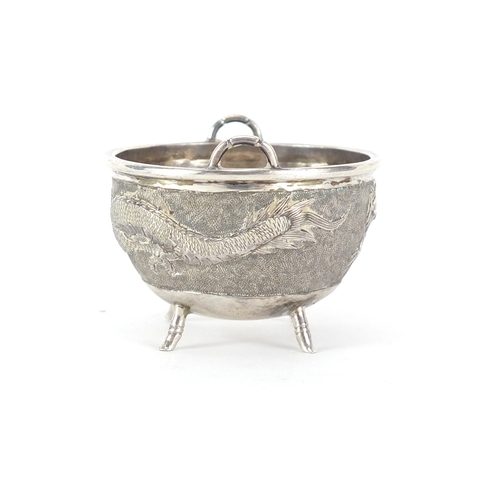 477 - Chinese silver four footed bowl with handles by Tuck Chang & Co, embossed with a dragon, impressed m... 