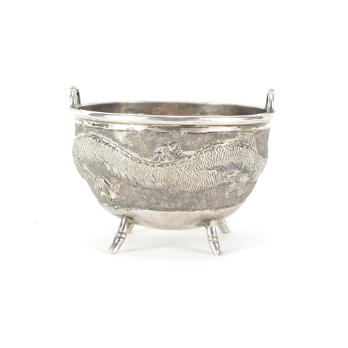 477 - Chinese silver four footed bowl with handles by Tuck Chang & Co, embossed with a dragon, impressed m... 