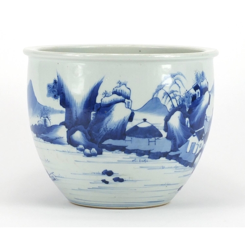 351 - Chinese blue and white porcelain jardiniere, hand painted with a figure crossing a bridge in a mount... 