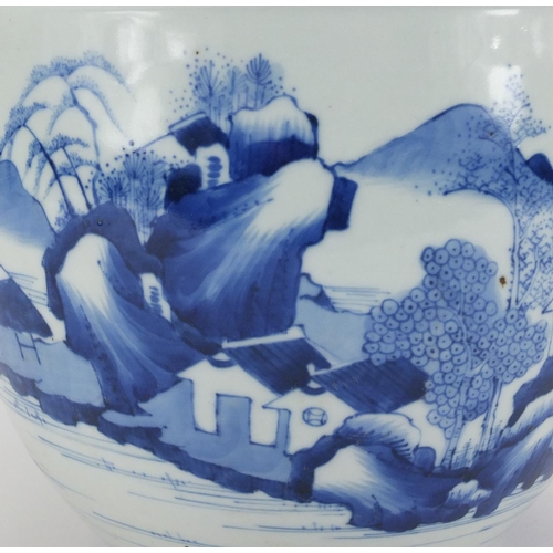 351 - Chinese blue and white porcelain jardiniere, hand painted with a figure crossing a bridge in a mount... 