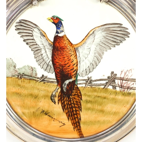 630 - Circular porcelain tray with sterling silver mount, hand painted with a pheasant, indistinctly signe... 