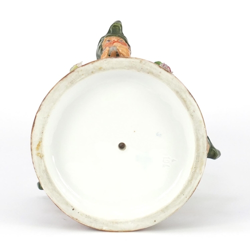 631 - Continental hand painted porcelain gnome design lamp base, indistinct factory marks to the base, num... 