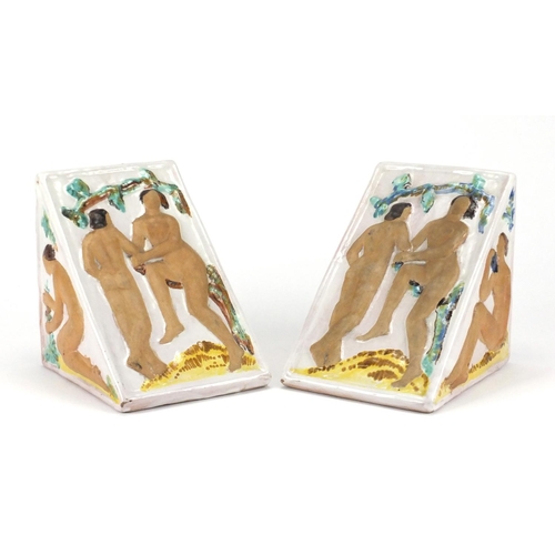 692 - Pair of rare Art Deco Plichta pottery bookends hand painted with Adam and Eve type figures, each ins... 