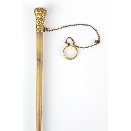 71 - Victorian gilt metal mounted rhinoceros horn swagger stick, 96cm in length, 53.4g