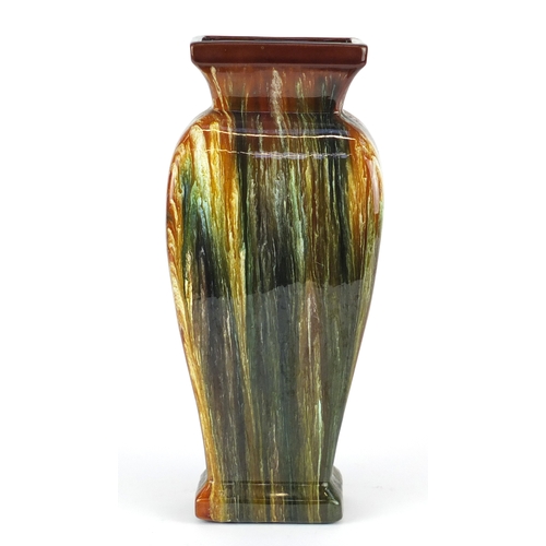 691 - Art Nouveau Bretby pottery vase, having a dripping glaze, in the style of Christopher Dresser, impre... 