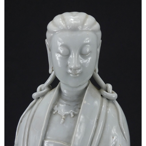 427 - Chinese blanc de chine porcelain figure of an empress holding a scepter, character seal marks to the... 