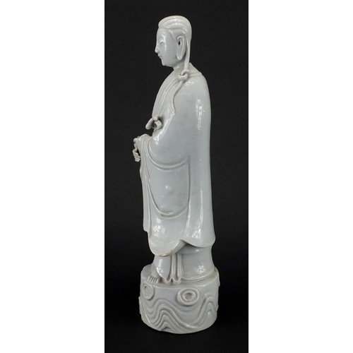 427 - Chinese blanc de chine porcelain figure of an empress holding a scepter, character seal marks to the... 