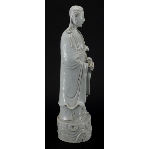 427 - Chinese blanc de chine porcelain figure of an empress holding a scepter, character seal marks to the... 