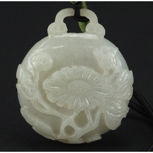 490 - Chinese white jade belt hook, finely carved with flowers, 6cm high